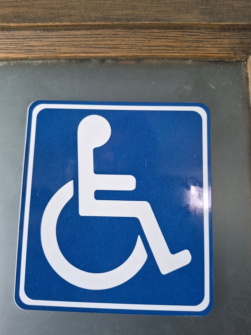 Handicap access sign on a door