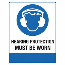 Load image into Gallery viewer, Sign with a blue circle featuring a white icon of ear protectors and text 'HEARING PROTECTION MUST BE WORN' on a white background.
