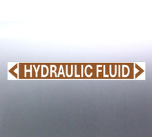 Load image into Gallery viewer, A rectangular brown label with the text 'HYDRAULIC FLUID' in bold white letters, surrounded by a white border and green arrows at the ends.
