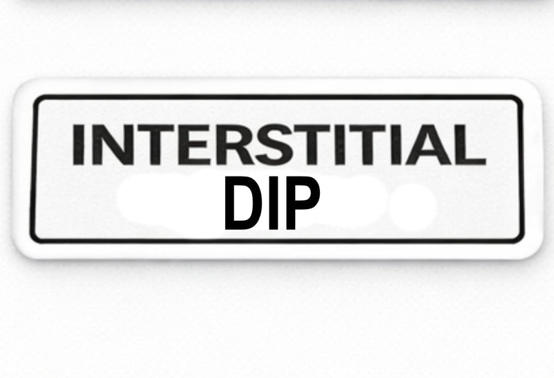 Rectangular sign with 'INTERSTITIAL DIP' text on a white background
