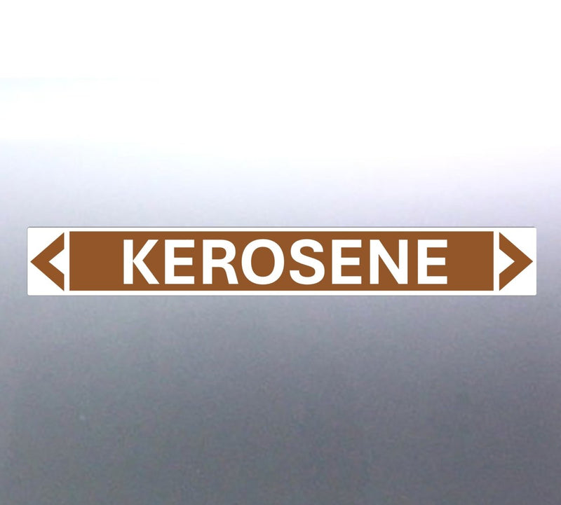A pipe marker label with the word 'KEROSENE' in bold black lettering on a golden tan background with a white border and green directional arrows pointing to the right.