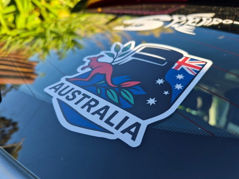 Ned Kelly Australia-themed car decal with kangaroo and Eucalyptus leaves on a reflective surface.