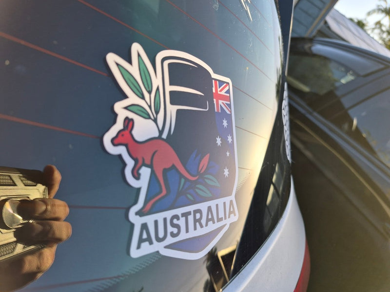 Ned Kelly Sticker of an Australian flag with kangaroo on a car window