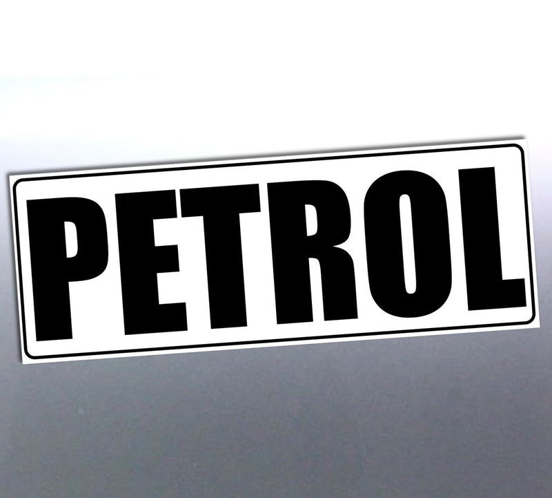 Sticker with 'PETROL' text on a reflective surface