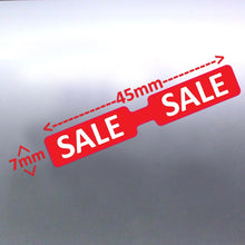 Load image into Gallery viewer, White 45x7mm foldable retail sticker tags showing SALE text options.
