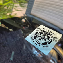 Load image into Gallery viewer, Service die Sticker with a Customer logo design and text on a vehicle's window.
