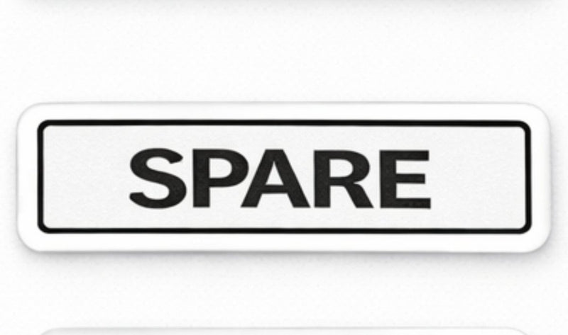Spare part label with 'SPARE' text on a white background