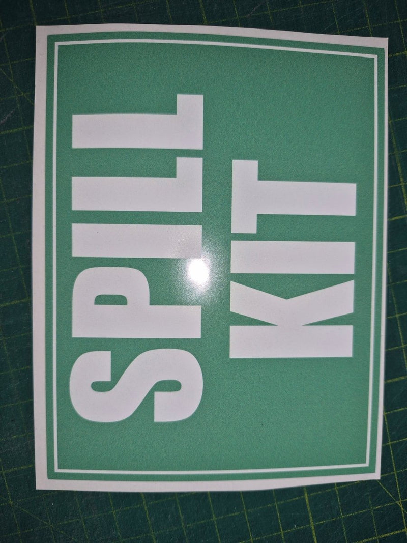 Green Sticker with 'SPILL KIT' text on a green background