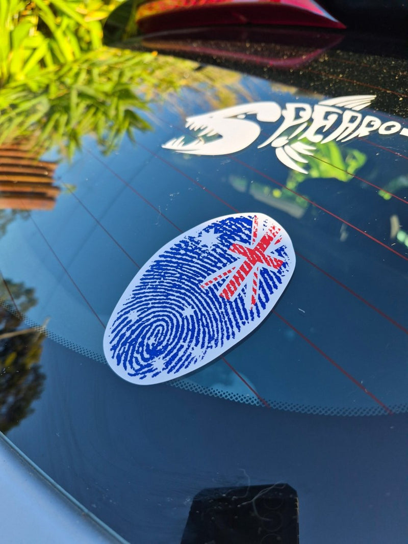 Car window with a fingerprint design decal featuring a Union Jack flag  Australian flag