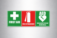 Load image into Gallery viewer, Three safety decals all in one for first aid, fire extinguisher, and AED on a gray background
