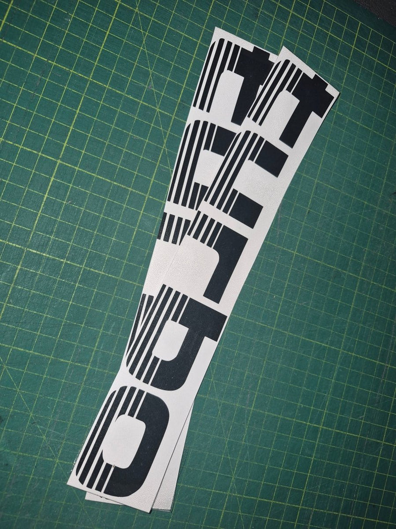 Turbo decal on a green cutting mat