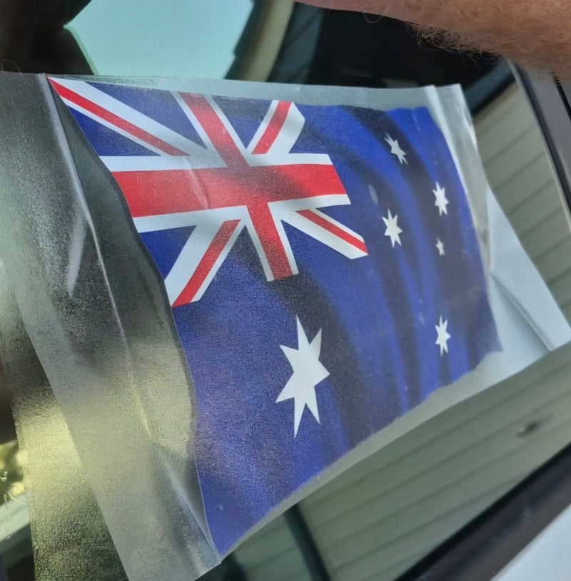 Australian flag sticker on a car window