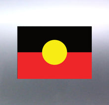 Load image into Gallery viewer, A rectangular vinyl sticker featuring the Aboriginal flag colors and design Decal on a silver car door

