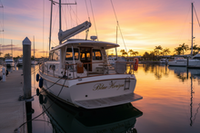 Load image into Gallery viewer, Blue Horizon - motor sailer Queensland sunset
