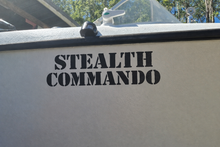 Load image into Gallery viewer, Boat with 'Stealth Commando' decal on a sunny day
