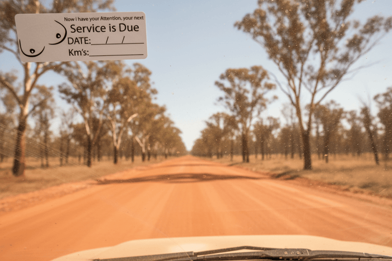 Booby sticker on dusty 4WD windscreen outback