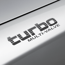 Load image into Gallery viewer, Close-up of black Turbo Multi-Valve vinyl-cut sticker edge detail
