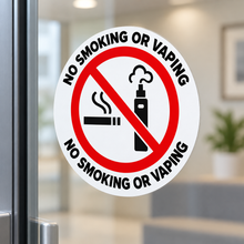 Load image into Gallery viewer, Close-up of no smoking or vaping sticker on glass
