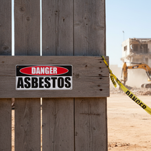 Load image into Gallery viewer, Danger Asbestos on wooden hoarding

