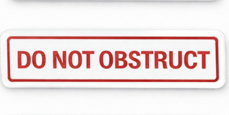 Rectangular sign with 'DO NOT OBSTRUCT' text on a white background