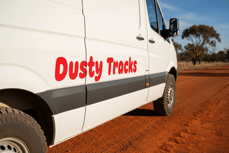 Dusty Tracks - campervan red rounded font