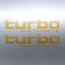 Load image into Gallery viewer, Gold Turbo Multi-Valve stickers on grey panel
