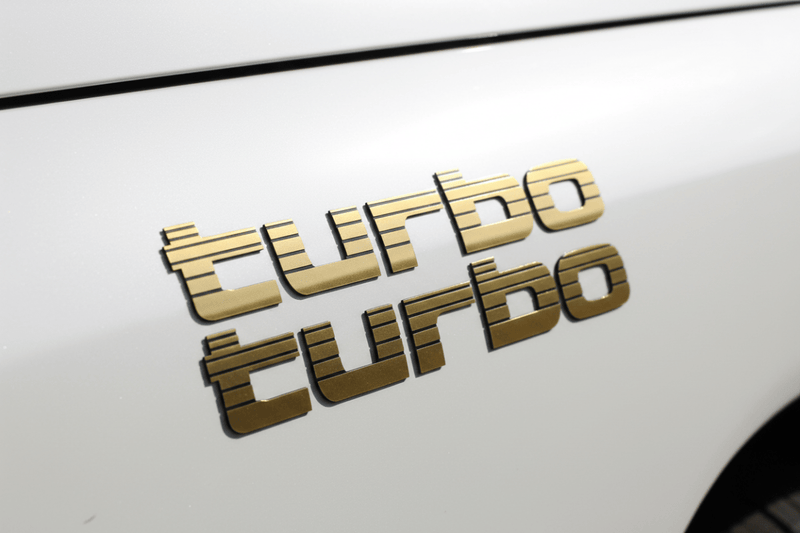 Gold Turbo sticker close-up white LandCruiser
