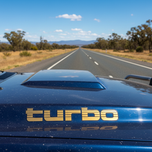 Load image into Gallery viewer, Gold Turbo sticker on diesel 4WD bonnet scoop
