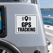 Load image into Gallery viewer, GPS Tracking Sticker in black on white vinyl on a silver aluminium boat console
