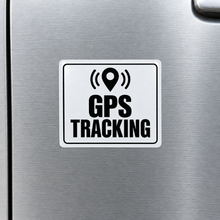 Load image into Gallery viewer, GPS Tracking Sticker showing black print, white vinyl and rounded edges on a silver door
