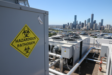 Load image into Gallery viewer, HAZMAT sticker on rooftop chiller unit
