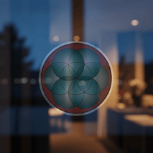 Load image into Gallery viewer, Life Mandala clear window sticker in evening light

