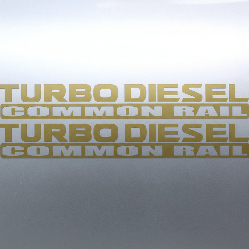 Matte gold Turbo Diesel Common Rail stickers on grey panel