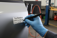 Load image into Gallery viewer, Mechanic filling out sticker
