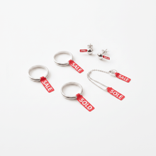 Load image into Gallery viewer, Mixed jewelry with SALE and SOLD foldable tags
