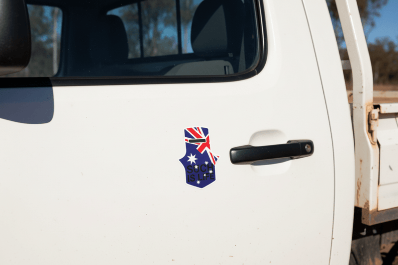 Ned Kelly sticker on ute door panel