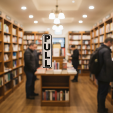 Load image into Gallery viewer, PULL Sign on Bookstore
