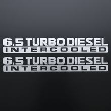 Load image into Gallery viewer, Satin silver-grey 6.5 Turbo Diesel Intercooled stickers on dark background
