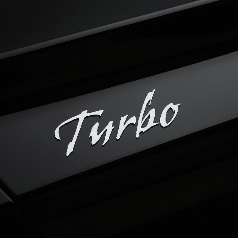 Silver Gothic Turbo sticker on black car panel