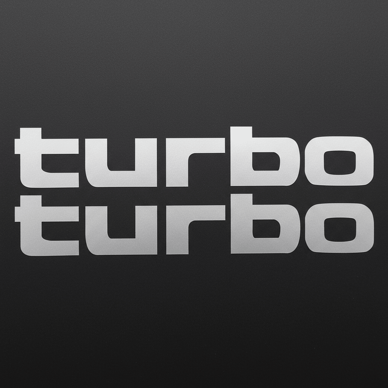Silver-grey solid turbo stickers on dark panel