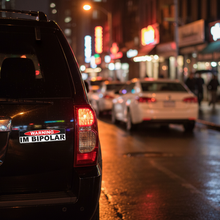 Load image into Gallery viewer, Sticker on black SUV at night
