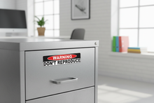 Load image into Gallery viewer, Sticker on filing cabinet
