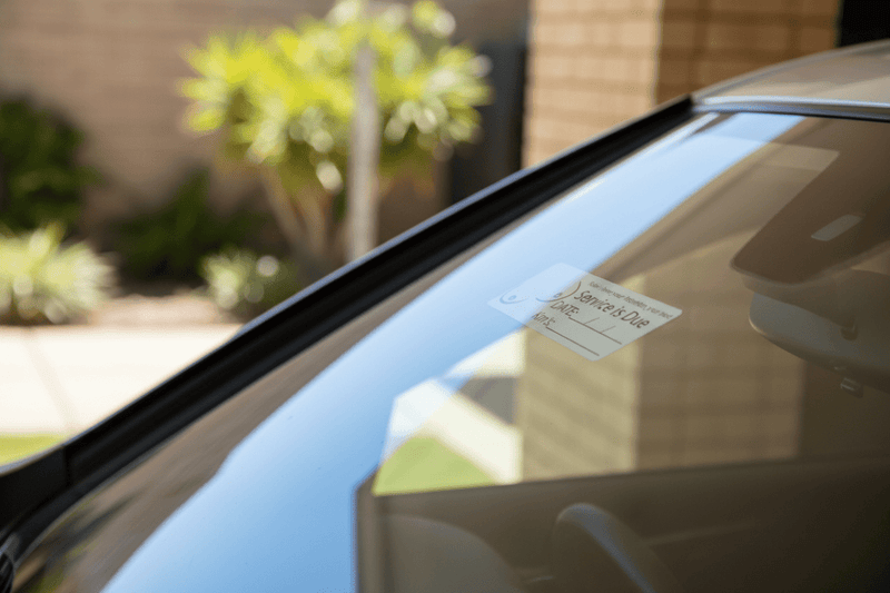 Sticker on windscreen outside looking in