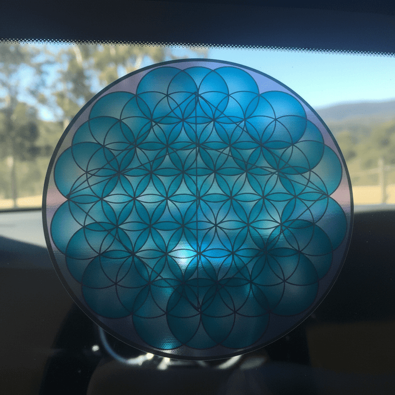 Trippy 3D pyramid sticker on vehicle window