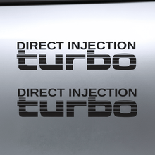 Load image into Gallery viewer, Two black Direct Injection turbo stickers stacked on grey panel
