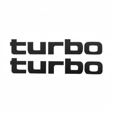 Load image into Gallery viewer, Two black solid turbo stickers flat lay on white

