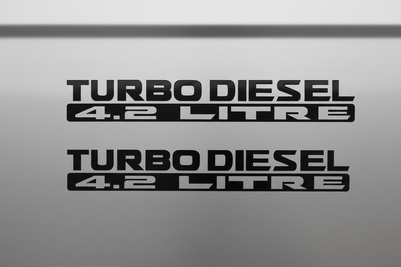 Two black Turbo Diesel 4.2 Litre stickers stacked