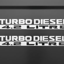 Load image into Gallery viewer, Two white Turbo Diesel 4.2 Litre stickers stacked
