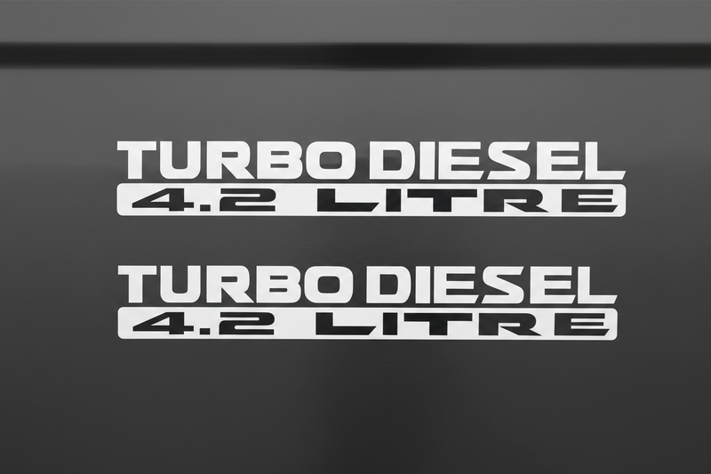 Two white Turbo Diesel 4.2 Litre stickers stacked