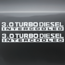 Load image into Gallery viewer, White 3.0 Turbo Diesel Intercooled stickers on dark background
